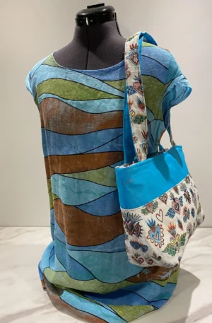 sac zippé turquoise et jacquard coeurs