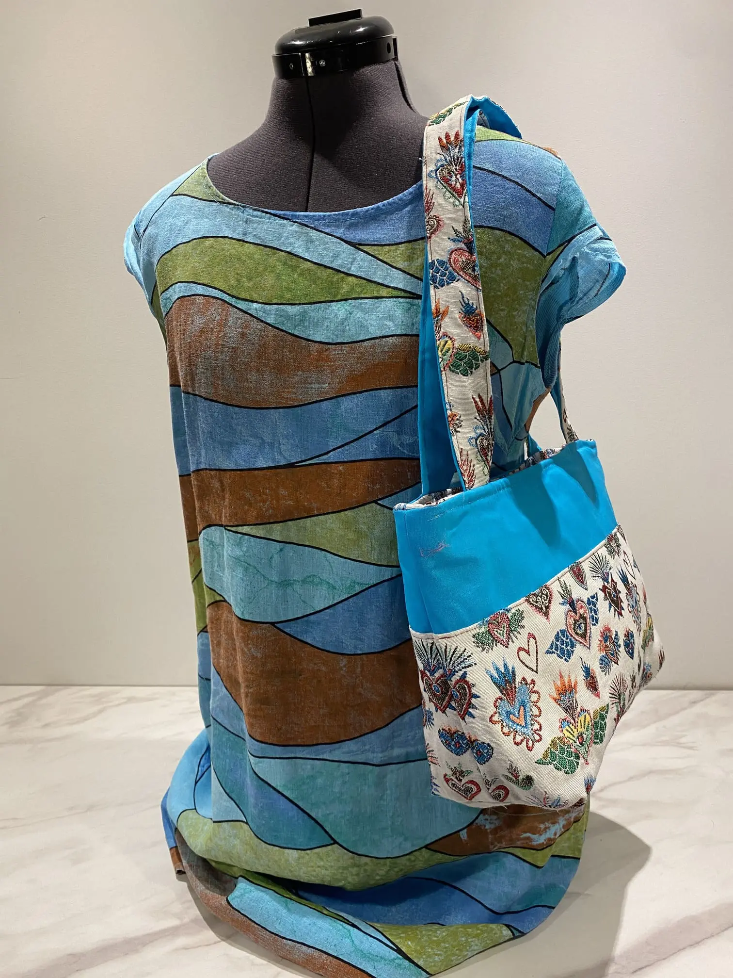 sac zippé turquoise et jacquard coeurs