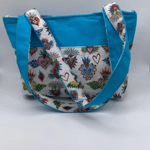 sac zippé turquoise et jacquard coeurs