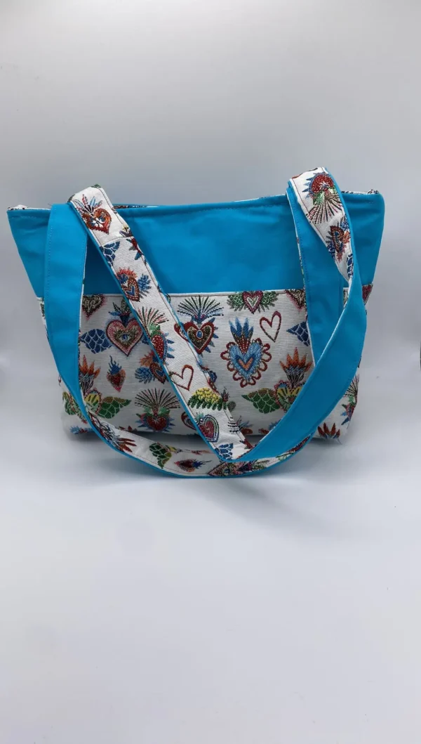 sac zippé turquoise et jacquard coeurs