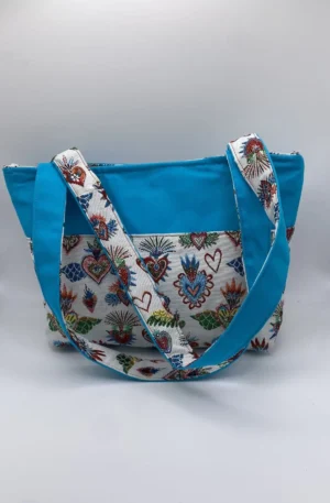 sac zippé turquoise et jacquard coeurs