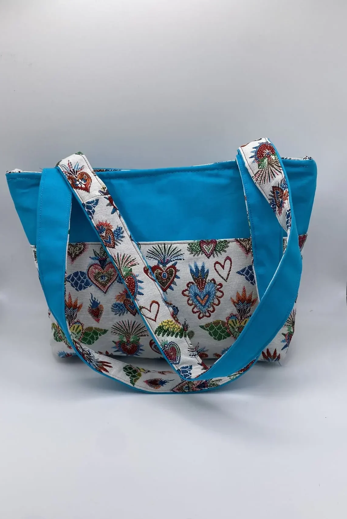 sac zippé turquoise et jacquard coeurs