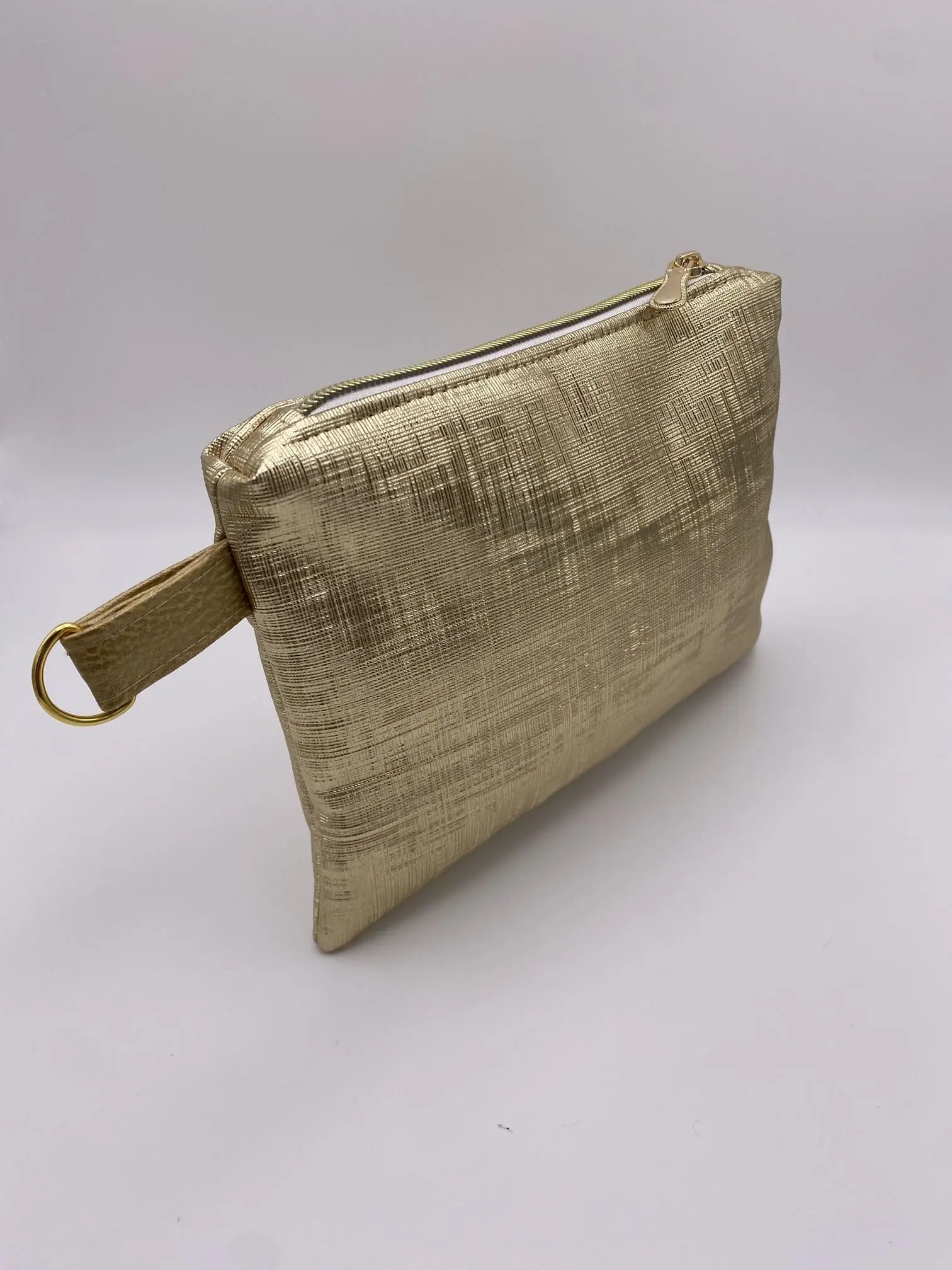POCHETTE IBIZA GRAPHIQUE DOREE