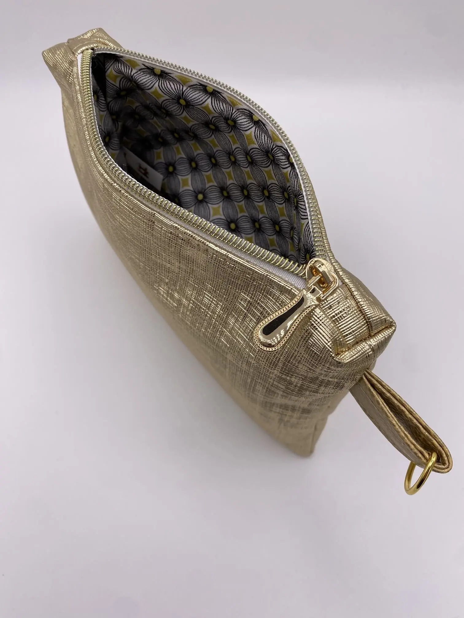 POCHETTE IBIZA GRAPHIQUE DOREE