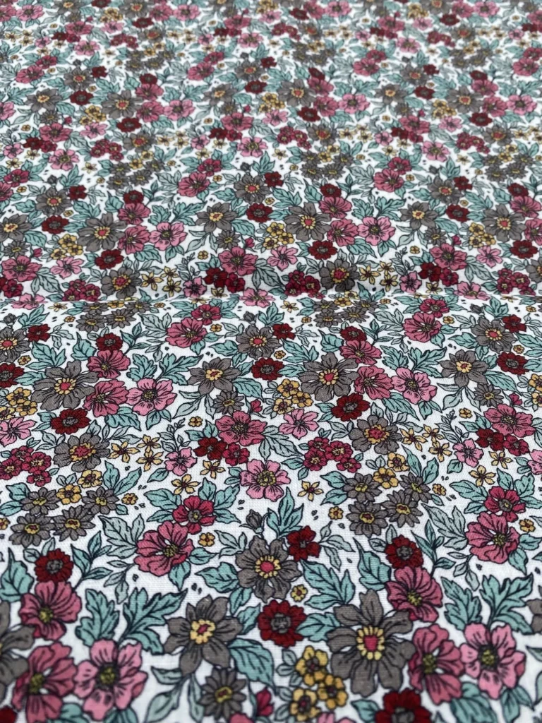 TISSU ENDUIT FLEURS TON ROSE BLEU GRIS