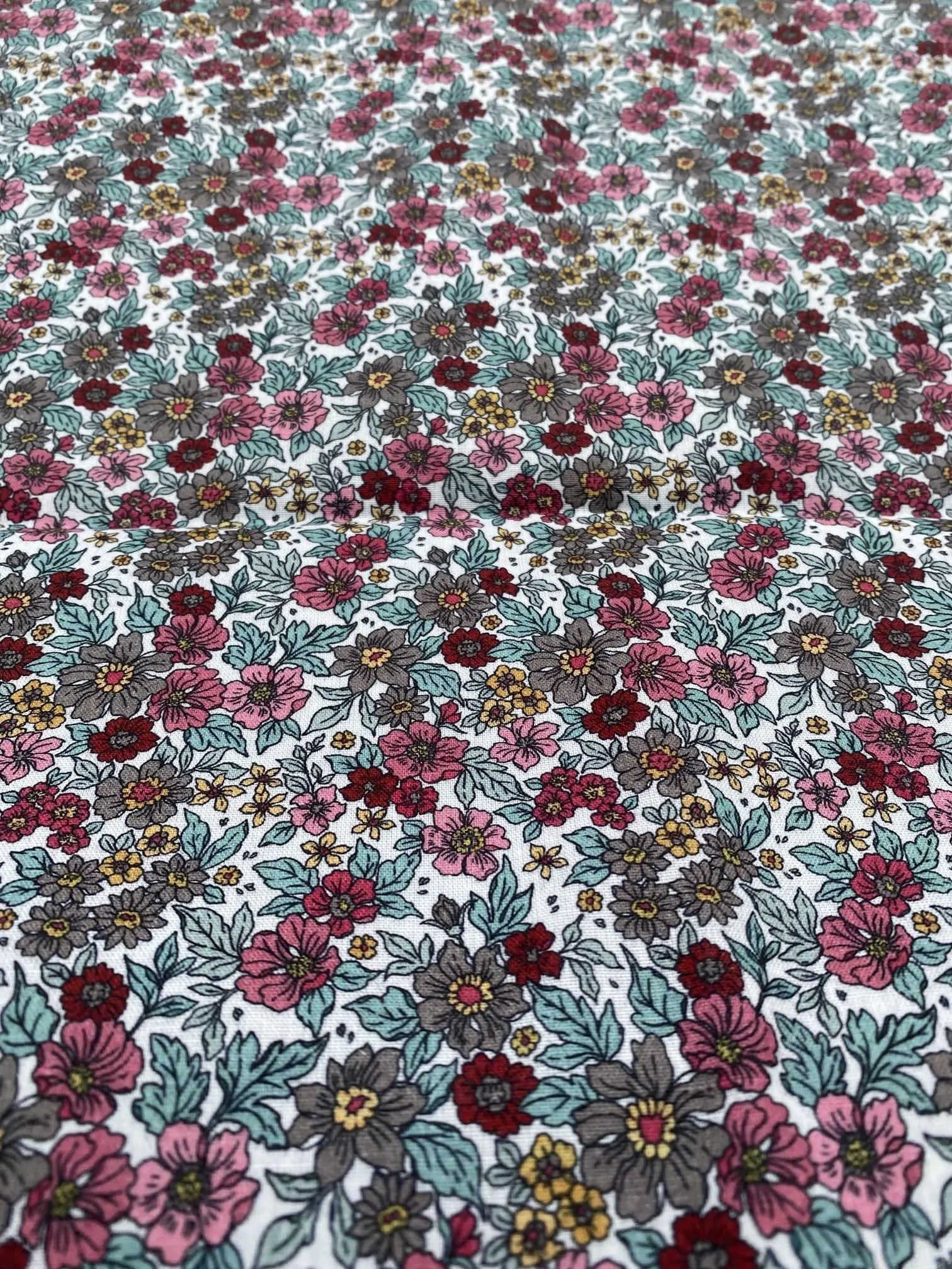 TISSU ENDUIT FLEURS TON ROSE BLEU GRIS