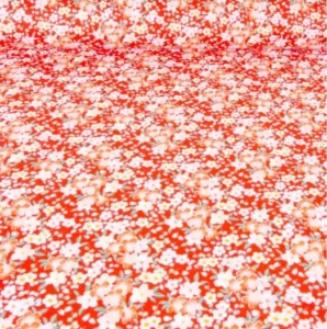 COTON IMPRIME ARTY FLORAL LIA SUR FOND ROUGE GRAMMAGE LEGER