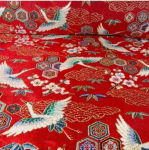 JACQUARD D AMEUBLEMENT TISSE TEINT GRUES SUR FOND ROUGE