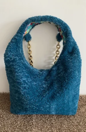 sac DEMI LUNE TURQUOISE FAUSSE FOURRURE