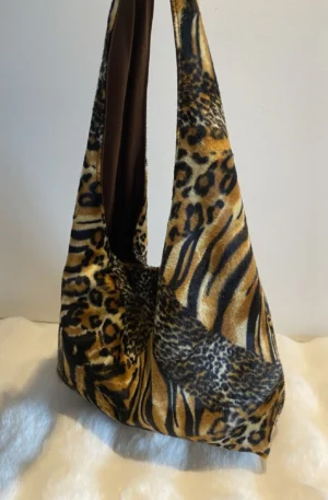 SAC DEMI LUNE JUNGLE FOURRURE