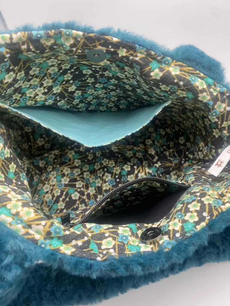 SAC TRANQUILLE BOUTON PRESSION FAUSSE FOURRURE TURQUOISE