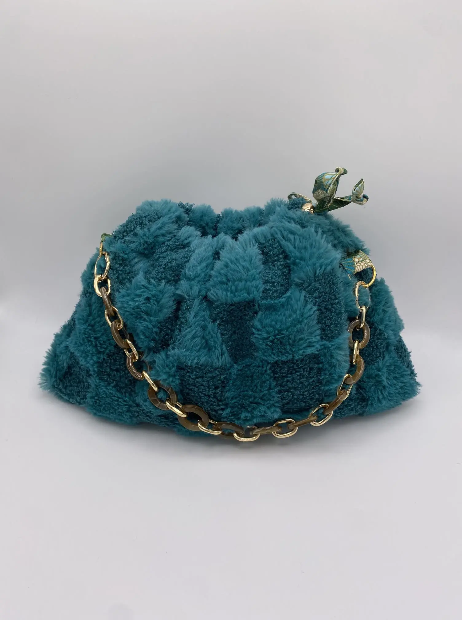 MODELE POCHON FOURRURE TURQUOISE