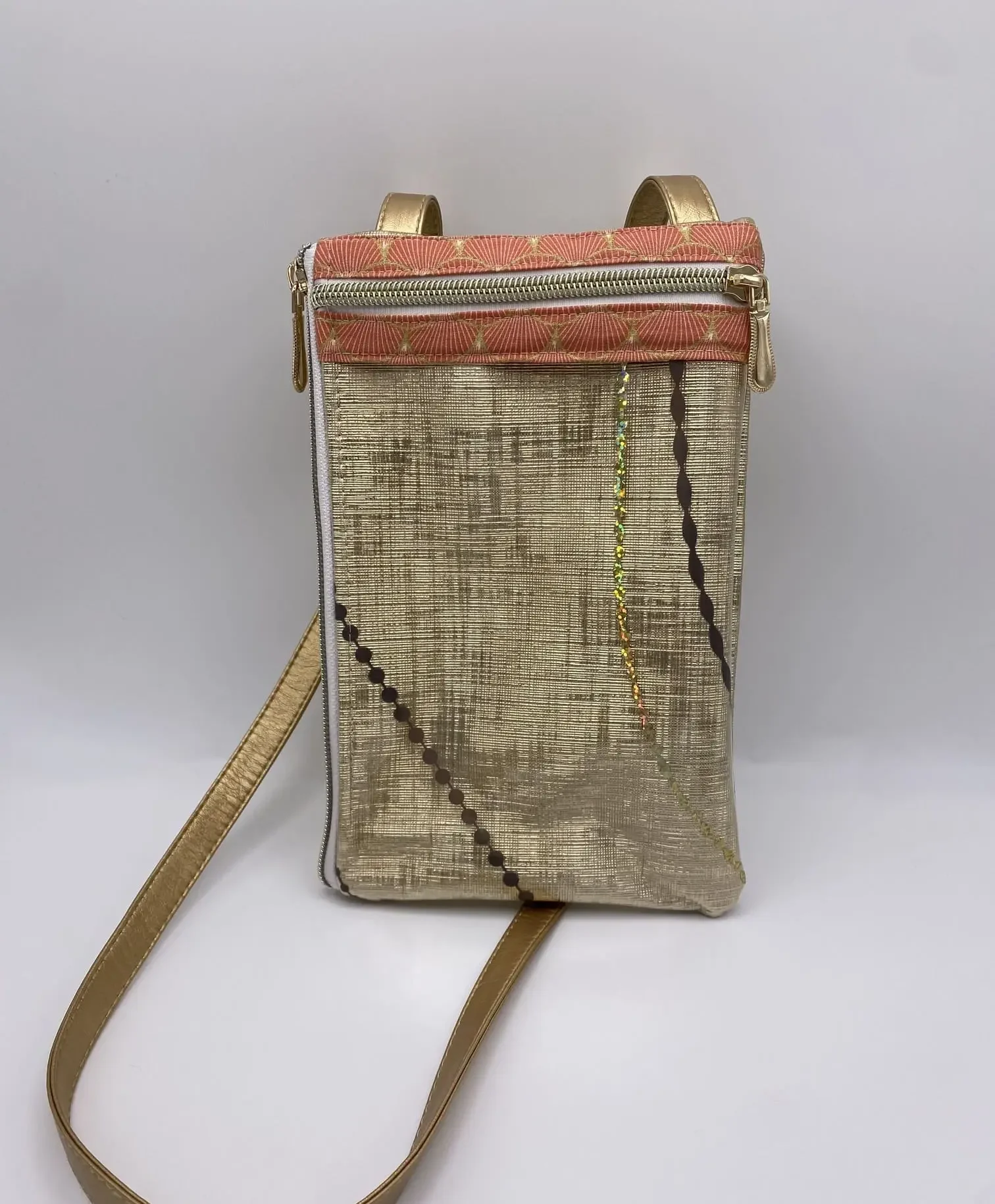 Pochette téléphone simili graphique doré