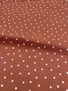 COTON POIS BLANC SUR FOND MARRON