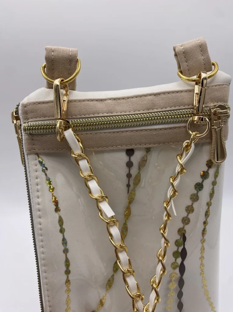 TELEPHONE POCHETTE SIMILI BLANC ET BRONZE