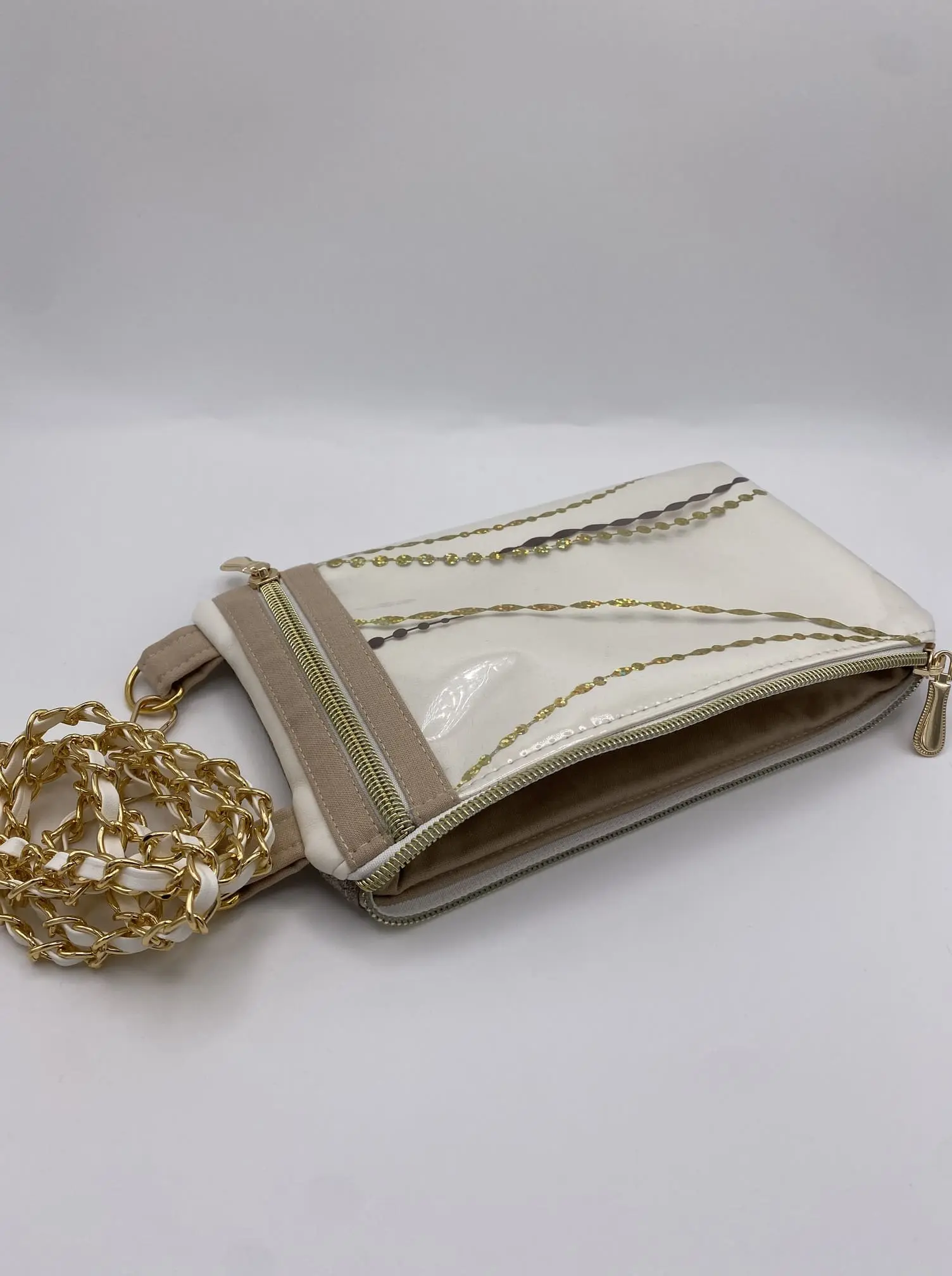 TELEPHONE POCHETTE SIMILI BLANC ET BRONZE